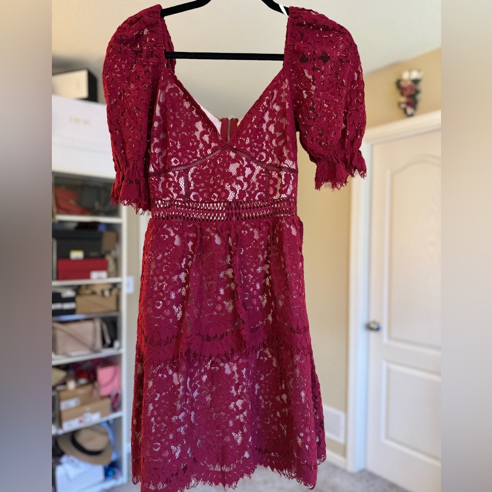 lulus dress, never worn.  Color is burgundy